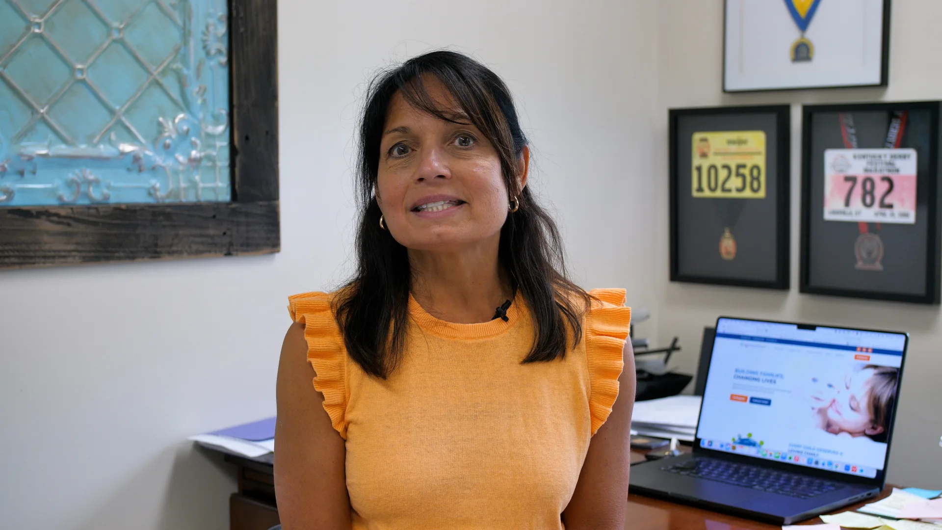 Julie Erwin, Executive Director of Adoption Assistance, in her office